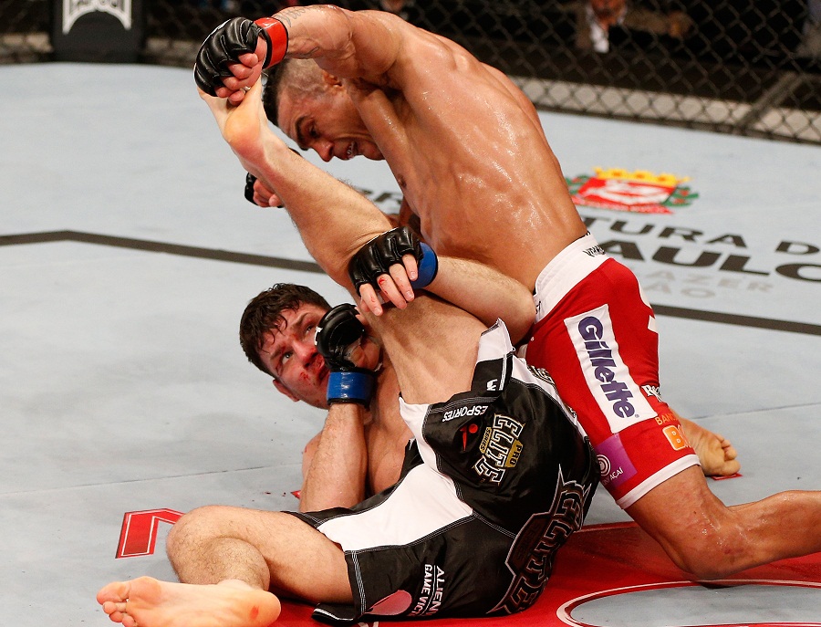 Vitor Belfort attempts to stop Michael Bisping