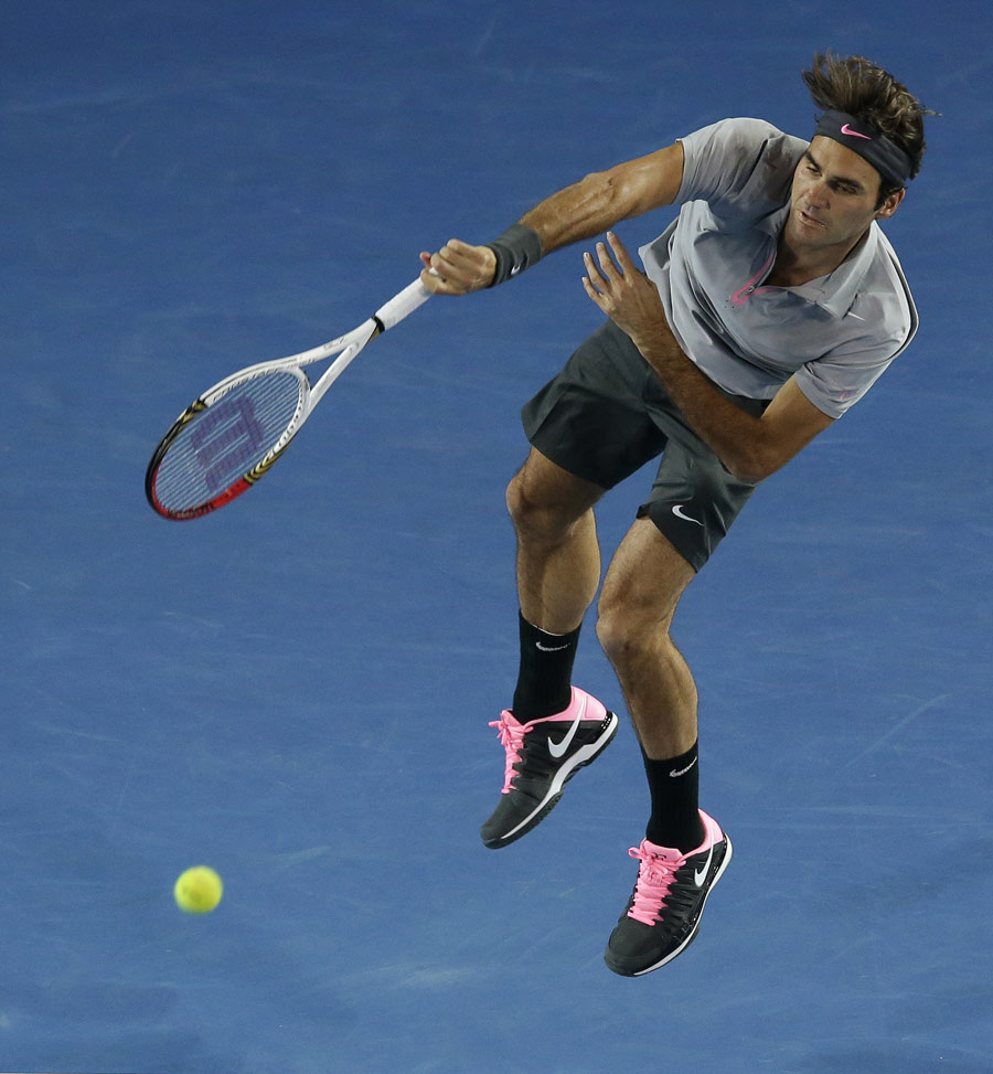 Roger Federer powers down a serve