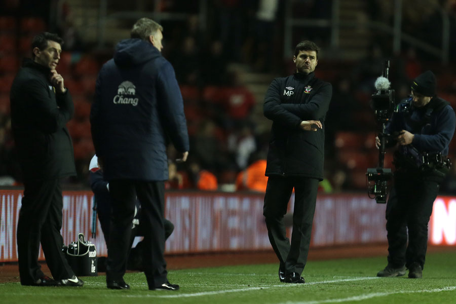 David Moyes and Mauricio Pochettino watch the action from the touchlines