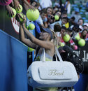 Maria Sharapova signs autographs following her win over Ekaterina Makarova