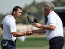 Paul Casey shakes hands with Colin Montgomerie