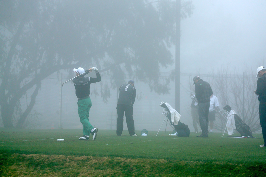 Players practise in the fog