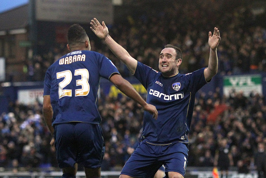Oldham Athletic's Lee Croft celebrates his assist for team-mate Matt Smith (not in picture)