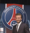 David Beckham arrives at a Paris Saint Germain press conference