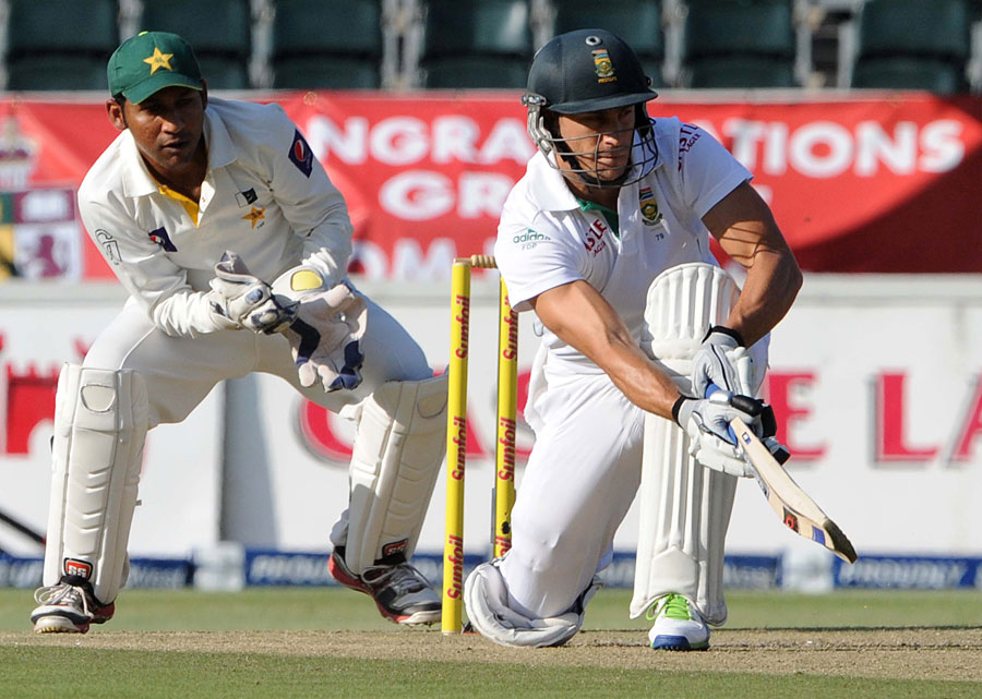 Faf du Plessis paddles the ball away