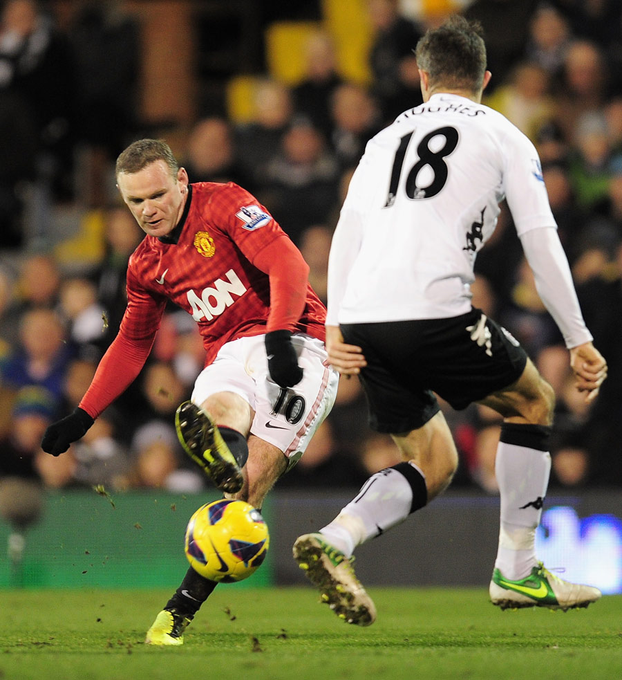 Wayne Rooney curls the ball home