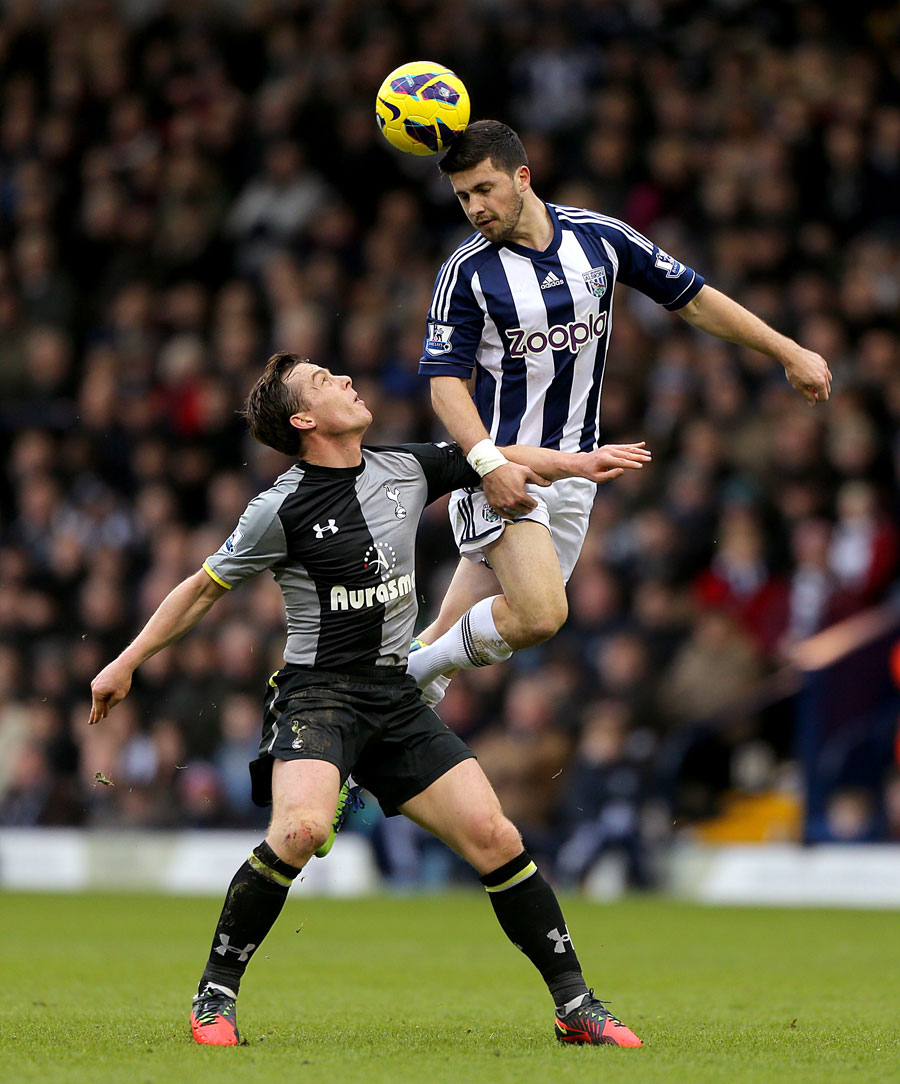 Tottenham Hotspur's Scott Parker (left) and West Bromwich Albion' Shane Long battle for the ball