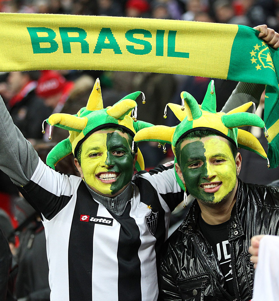 Brazil fans cheer on their team