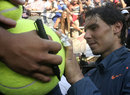 Rafael Nadal signs autographs for fans