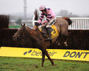 Silviniaco Conti, ridden by Ruby Walsh, lands running 