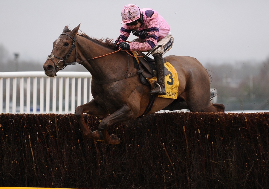 Silviniaco Conti, ridden by Ruby Walsh, jumps the last fence