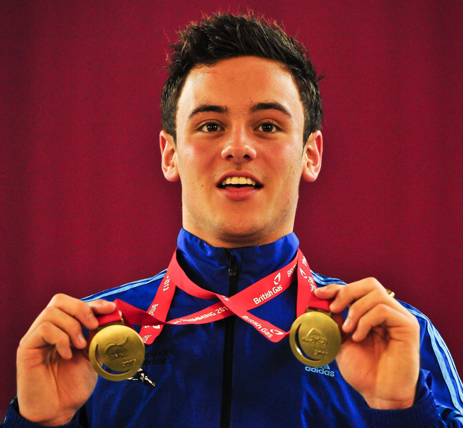 Tom Daley shows his gold medals
