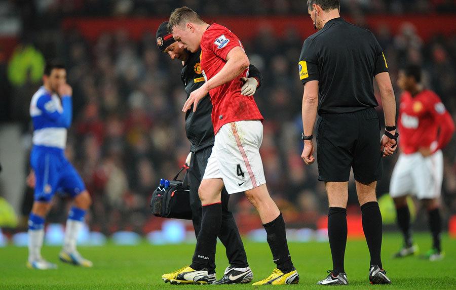 Phil Jones is helped off the pitch due to a injury 