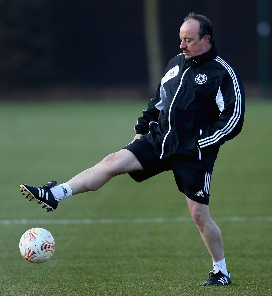 Rafael Benitez controls the ball during Chelsea training