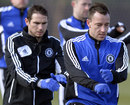 Frank Lampard and John Terry jog during Chelsea training