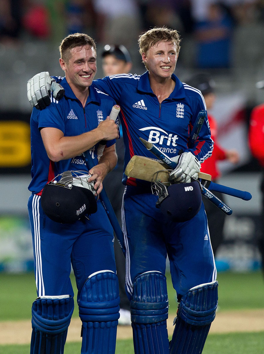 Joe Root, right, and Chris Woakes celebrate England's win