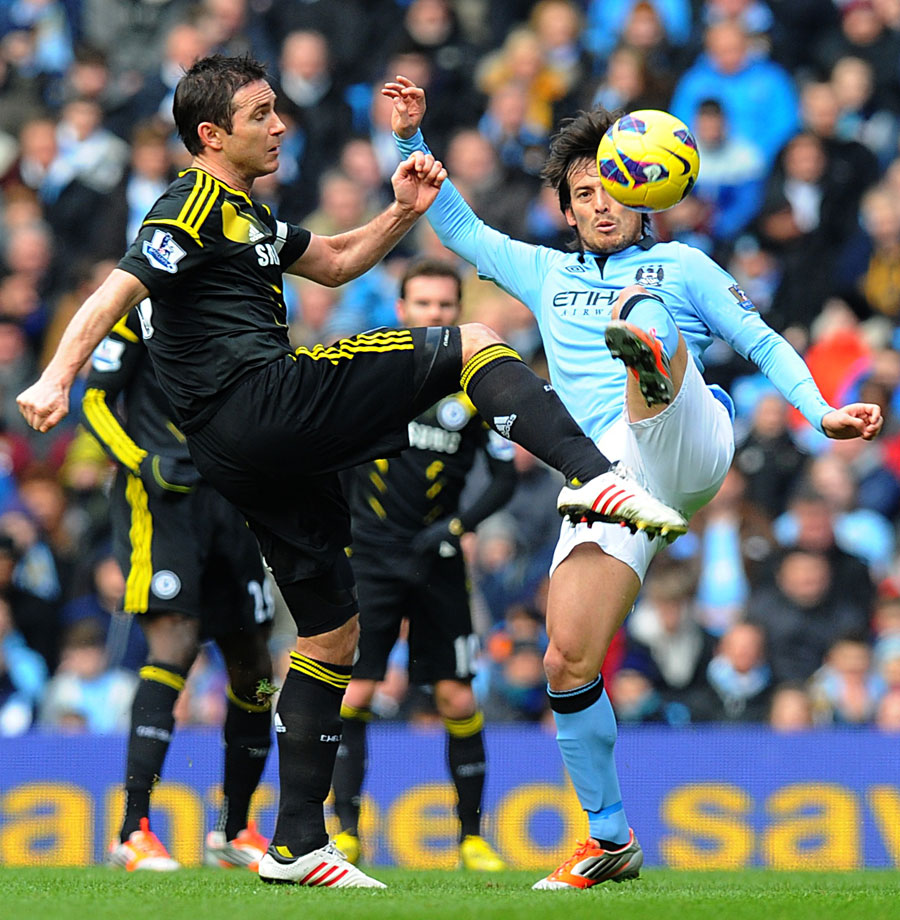 Frank Lampard and David Silva battle for the ball