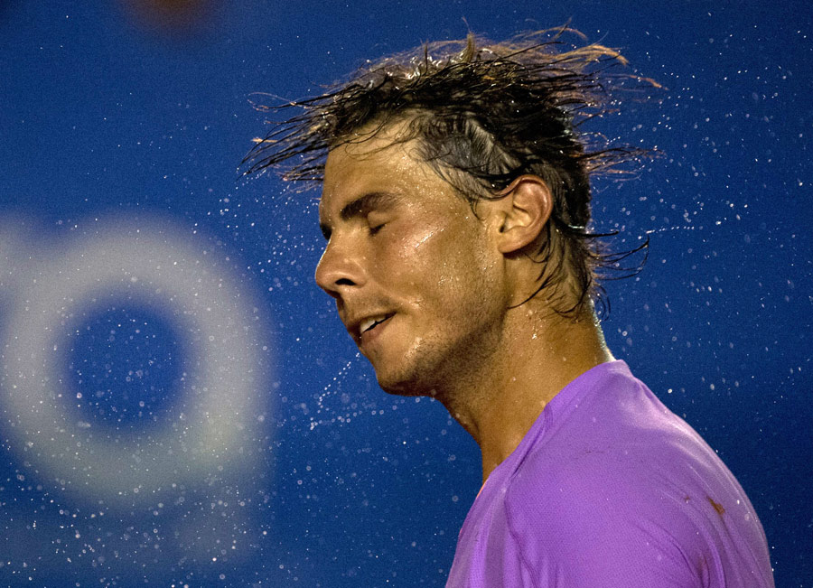 Rafael Nadal shakes off some sweat