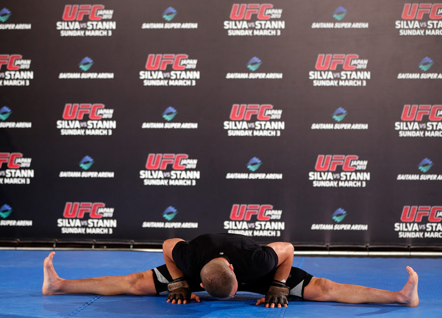 Diego Sanchez stretches during an open training session