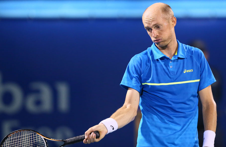 Nikolay Davydenko reacts after loosing a point to Roger Federer