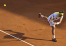 David Ferrer stretches for a backhand