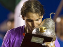Rafael Nadal kisses the trophy