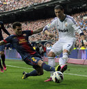 Cristiano Ronaldo attempts to cross beyond Daniel Alves