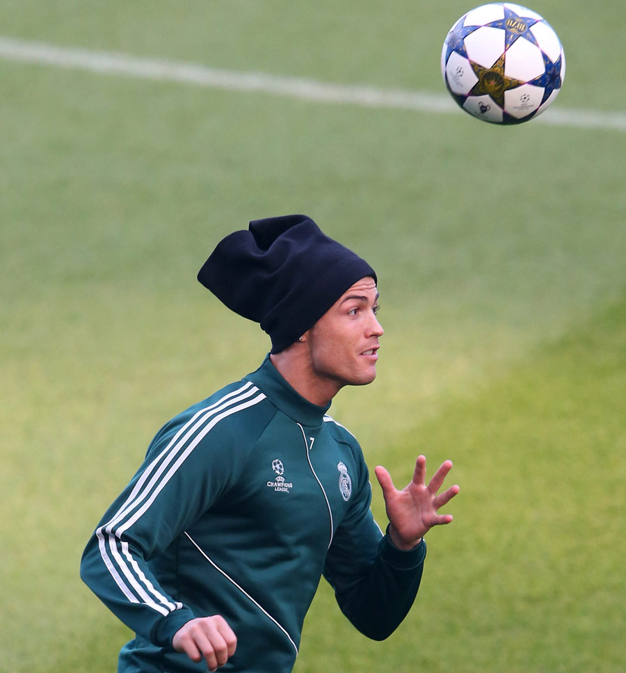 Cristiano Ronaldo juggles the ball during Real Madrid training