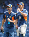 Michael Clarke and Shane Watson share a light moment during training