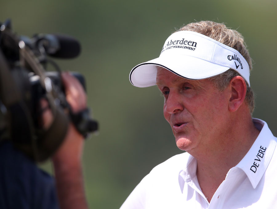 Colin Montgomerie is interviewed during practice