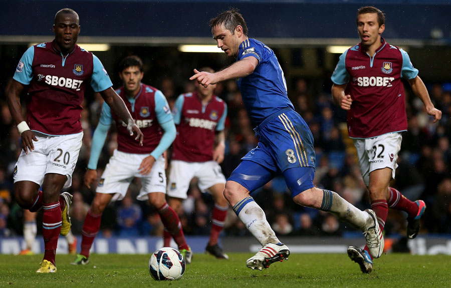 Frank Lampard taking on the West Ham defence