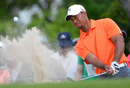 Tiger Woods fires out of a bunker during his second round at Bay Hill