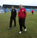 Roy Hodgson and Steven Gerrard assess the pitch