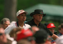 Tiger Woods stands alongside Greg Norman