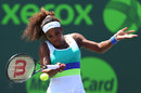 Serena Williams hitting a forehand against Maria Sharapova