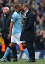 Vincent Kompany walks straight past Roberto Mancini after being substituted