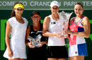 Laura Robson with her partner Lisa Raymond posing with her finalists' trophy