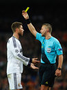Sergio Ramos pleads his innocence after picking up a yellow card