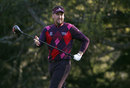 Ian Poulter reacts to his drive
