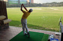 Tianlang Guan works on his picturesque golf swing for hours at a time in his native China