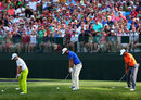  Tianlang Guan, Dustin Johnson and Tiger Woods entertain the crowd