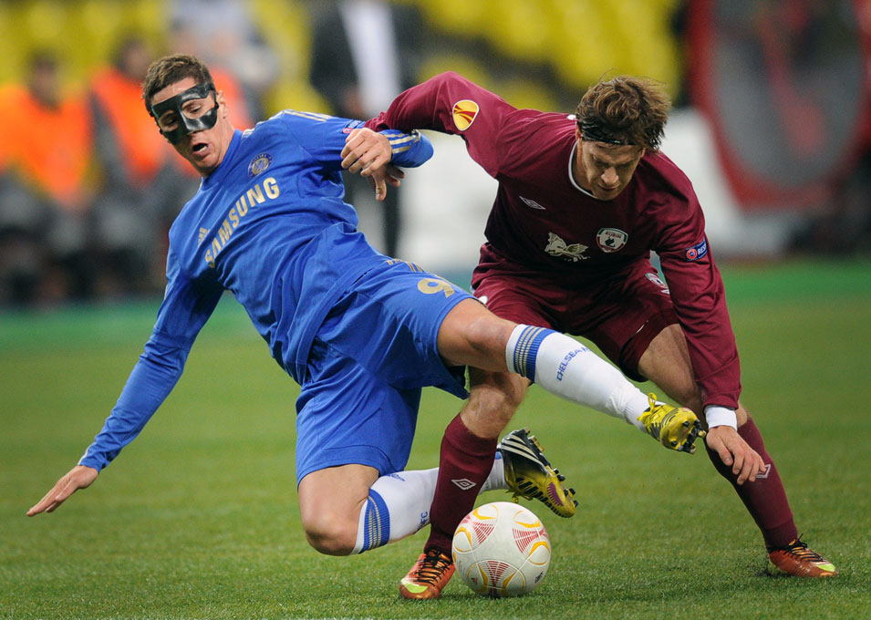 Chelsea forward Fernando Torres challenges for the ball