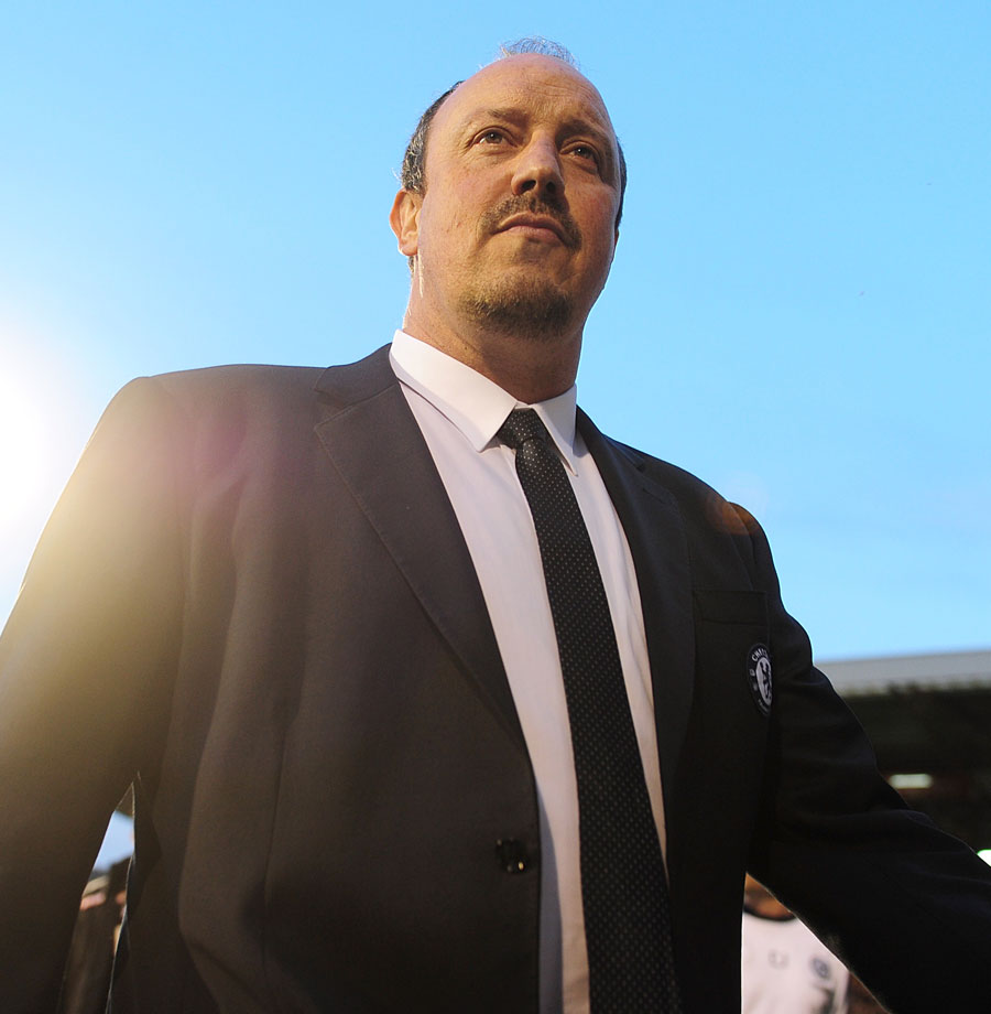 Rafael Benitez makes his way to the dugouts before the game