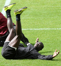 Papiss Cisse stretches during Newcastle training