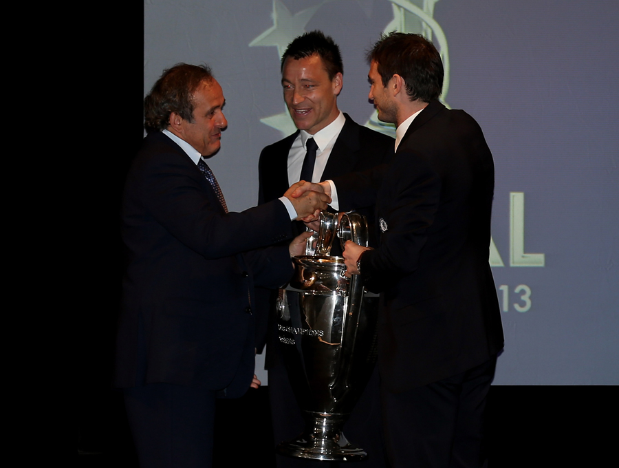John Terry and Frank Lampard hand back the Champions League trophy