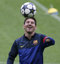 Lionel Messi juggles the ball in Barcelona training
