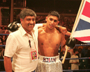 Amir Khan with his father after his professional debut