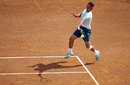 Rafael Nadal with feet off the ground with a forehand