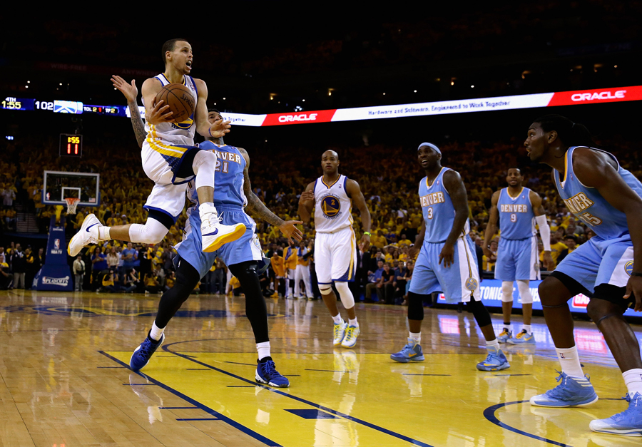 Stephen Curry rises for a lay-up