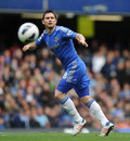 Frank Lampard plays a pass